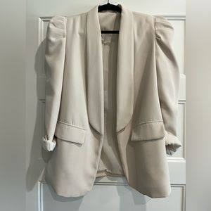 Women’s cream blazer.